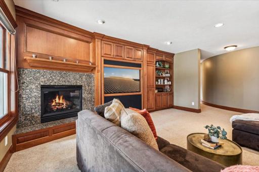 Lower level is warmed by the second gas fireplace.