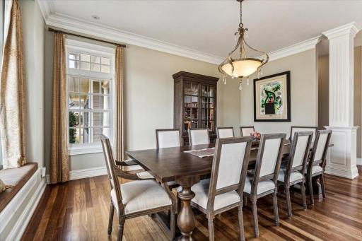 Note the crown molding trimwork and fluted columns.