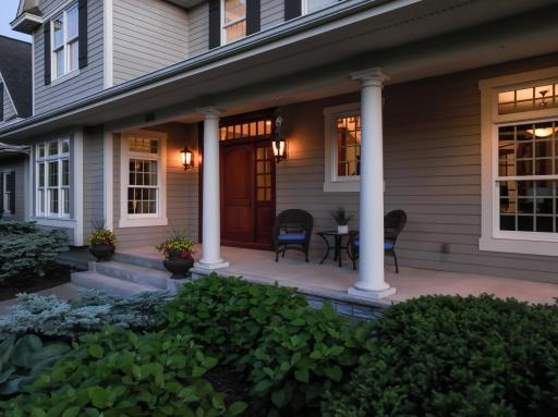 Relax on the Covered Wrap-around Front Porch! Lots of space for a swing or furniture to make this your Outdoor Room!