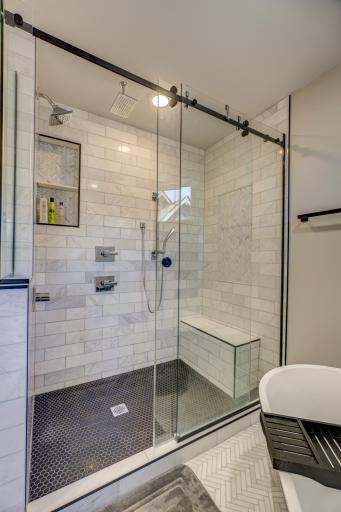 Double shower heads and niche for shower supplies
