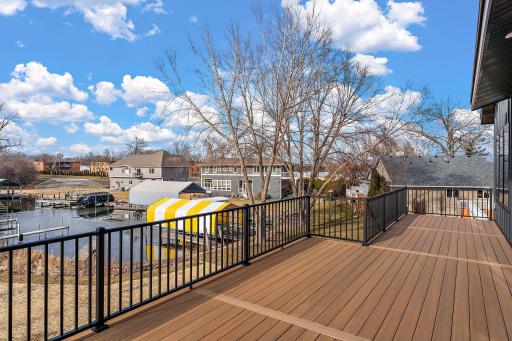 Lakefront views from your own massive maintenance free deck.