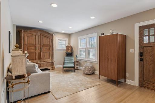 Such a quaint, lovely living room space as you walk in the front door. Floors have been recently refinished too.
