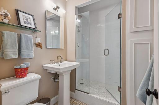 Great bathroom space with walk in shower upstairs