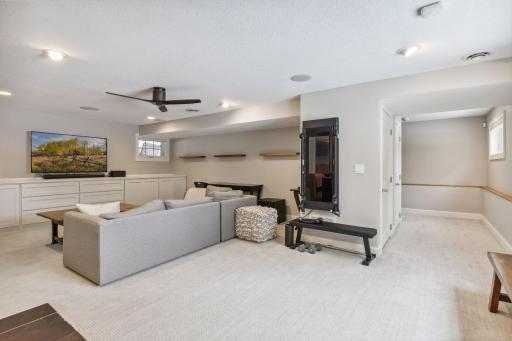 Awesome, spacious lower level family room space - perfect for relaxing & entertaining!!! Fresh, new carpet and tons of storage space