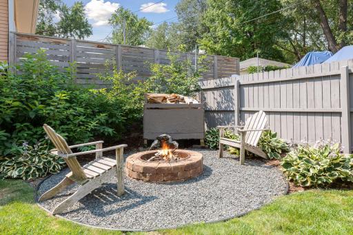 Firepit area in the back of your side yard to enjoy on those chilly nights!!