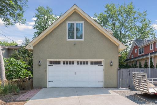 Now a heated garage!!! Awesome attached over-sized 2 car garage with additional off-street parking spot