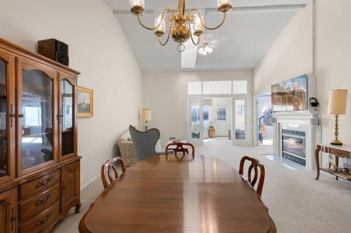 Large family/dining room with vaulted ceiling and beautiful lake view
