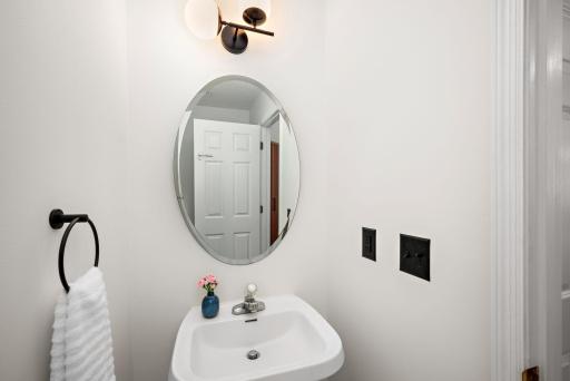 Convenient 1/2 bath on main level is perfect for guests