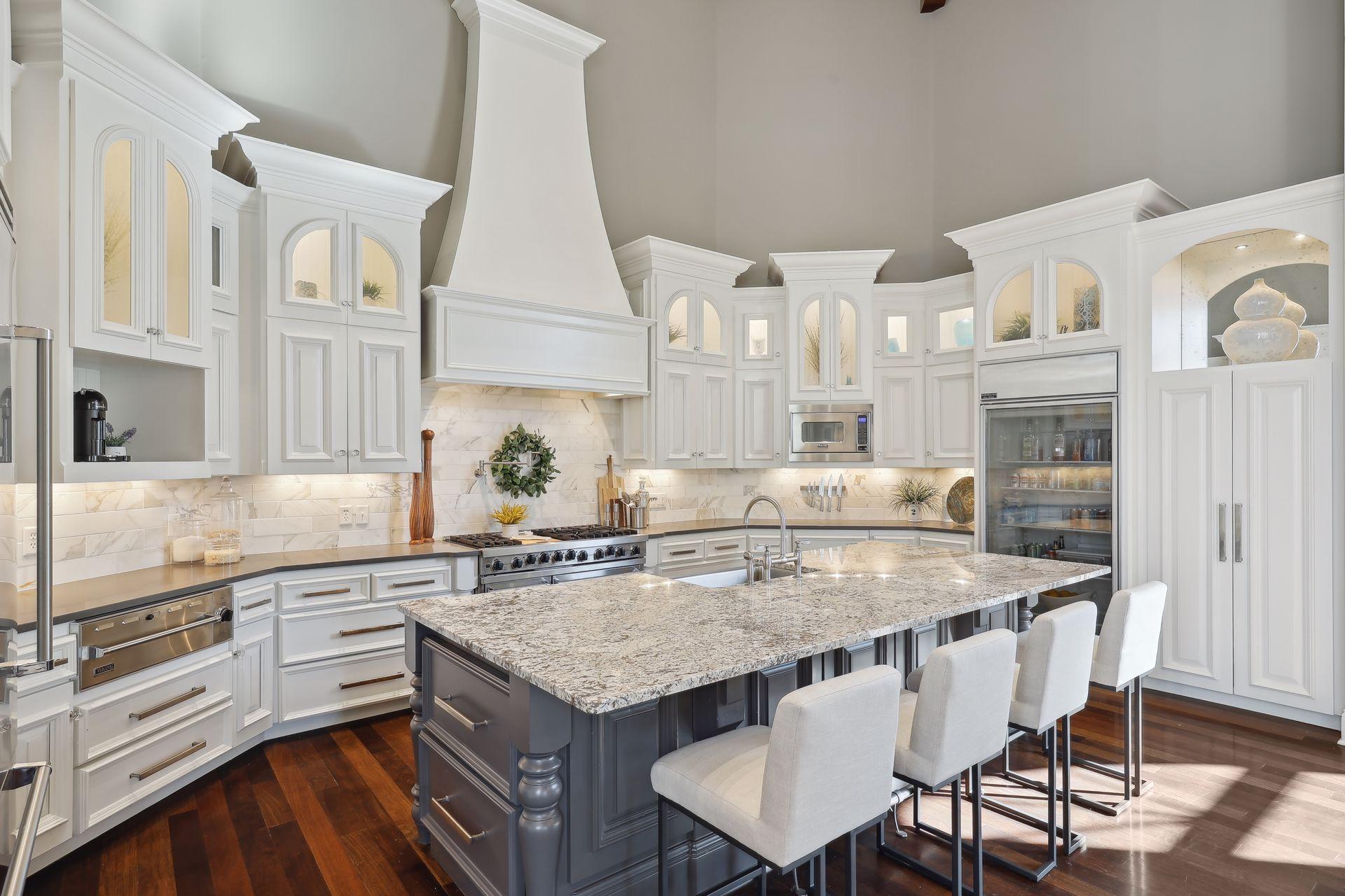 Gourmet U-shaped kitchen. Glass door beverage refrigerator