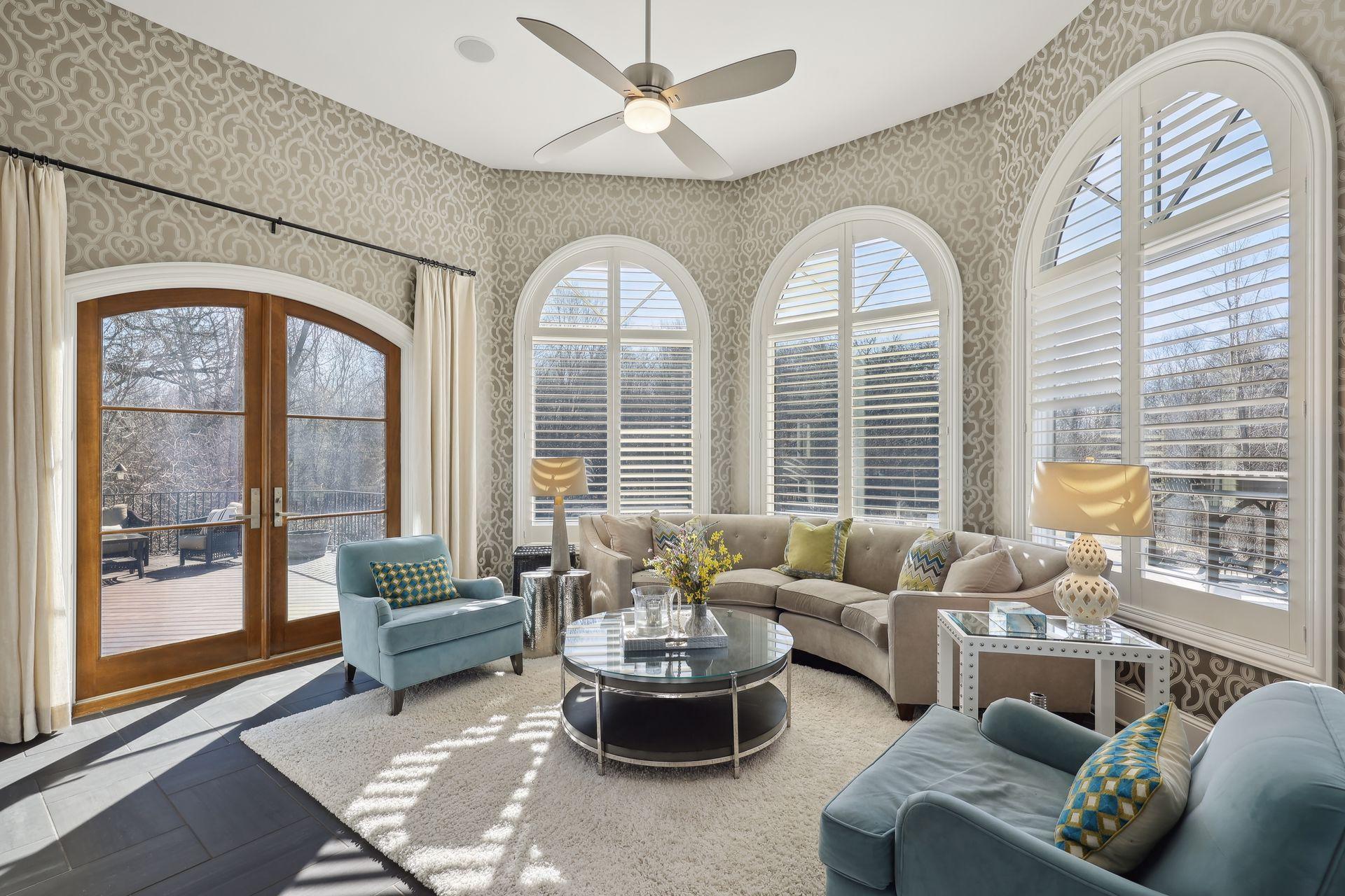 Large arched windows provide tons of natural light