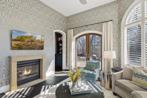 Sun room with french doors leading to deck