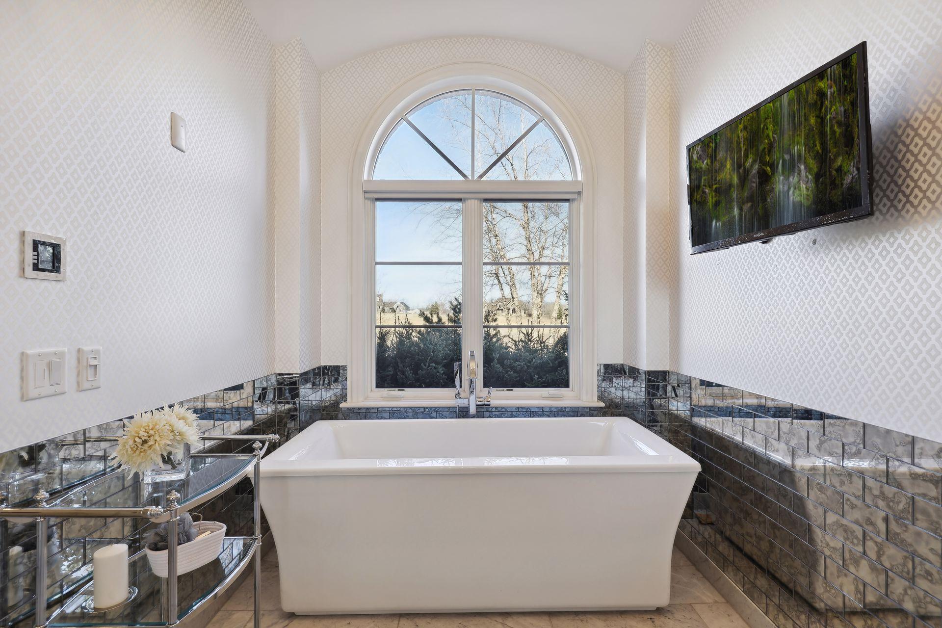 Soak in the tub while watching your favorite show