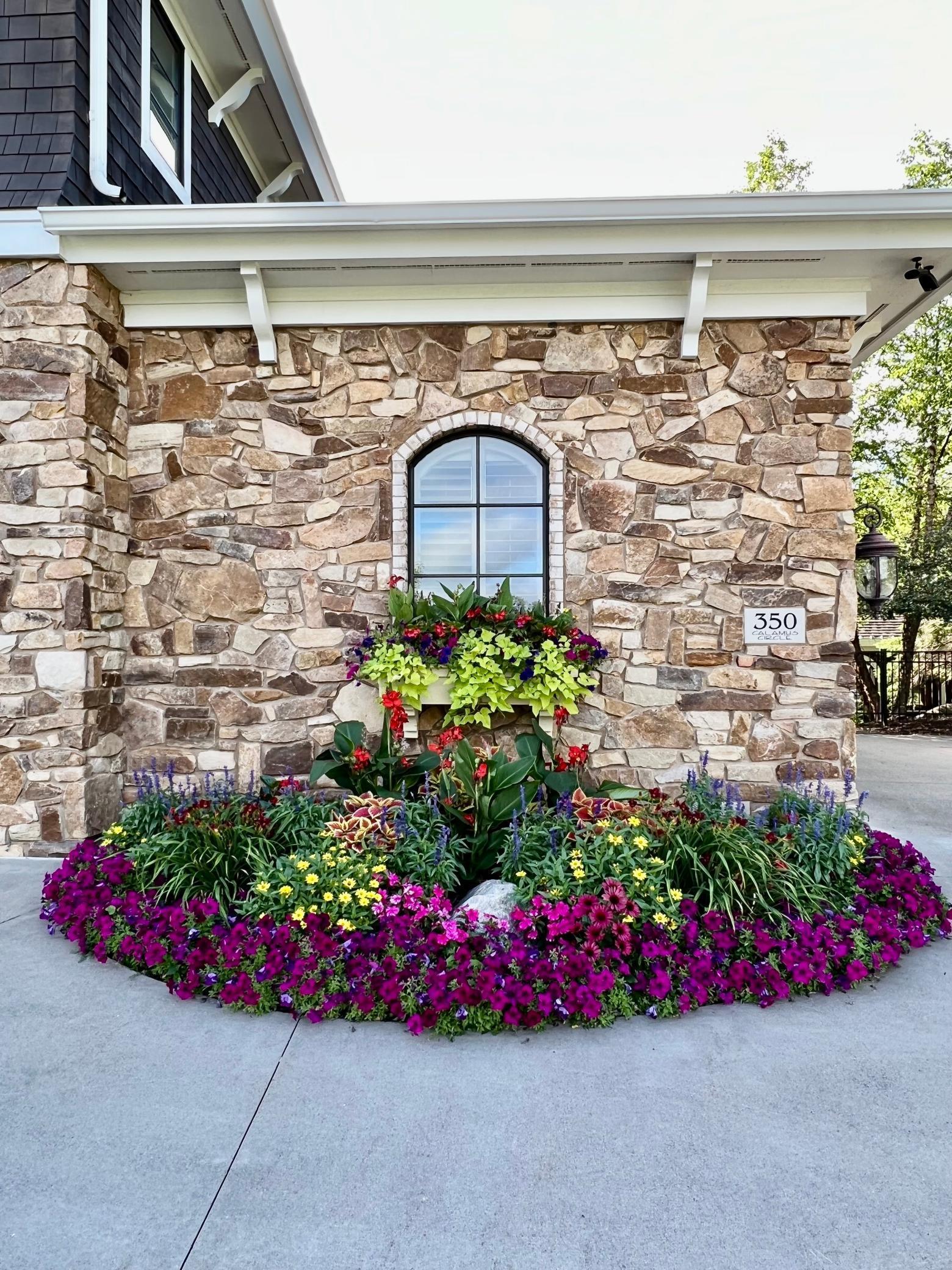 Beautiful flower beds throughout grounds