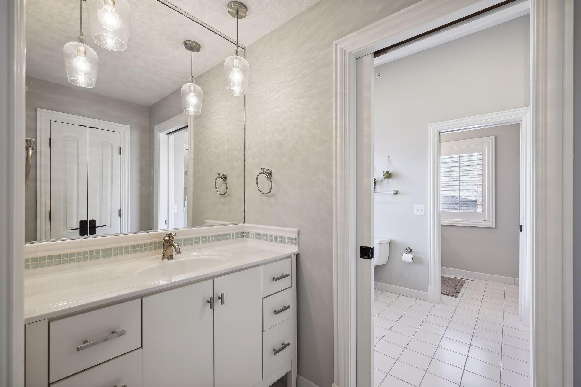 Jack & Jill full bath shared by BD 3 and 4