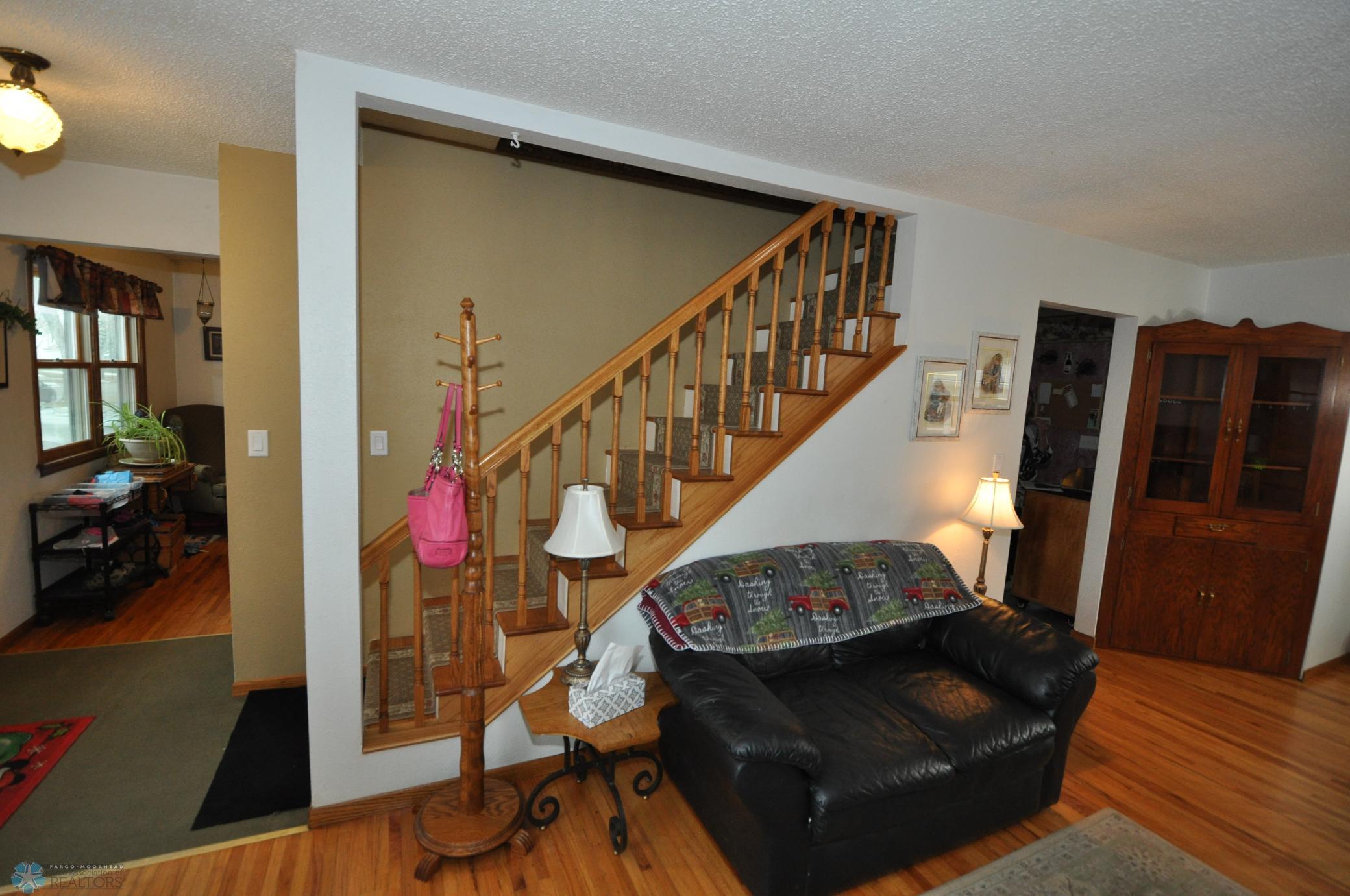 Custom open oak tread stairway