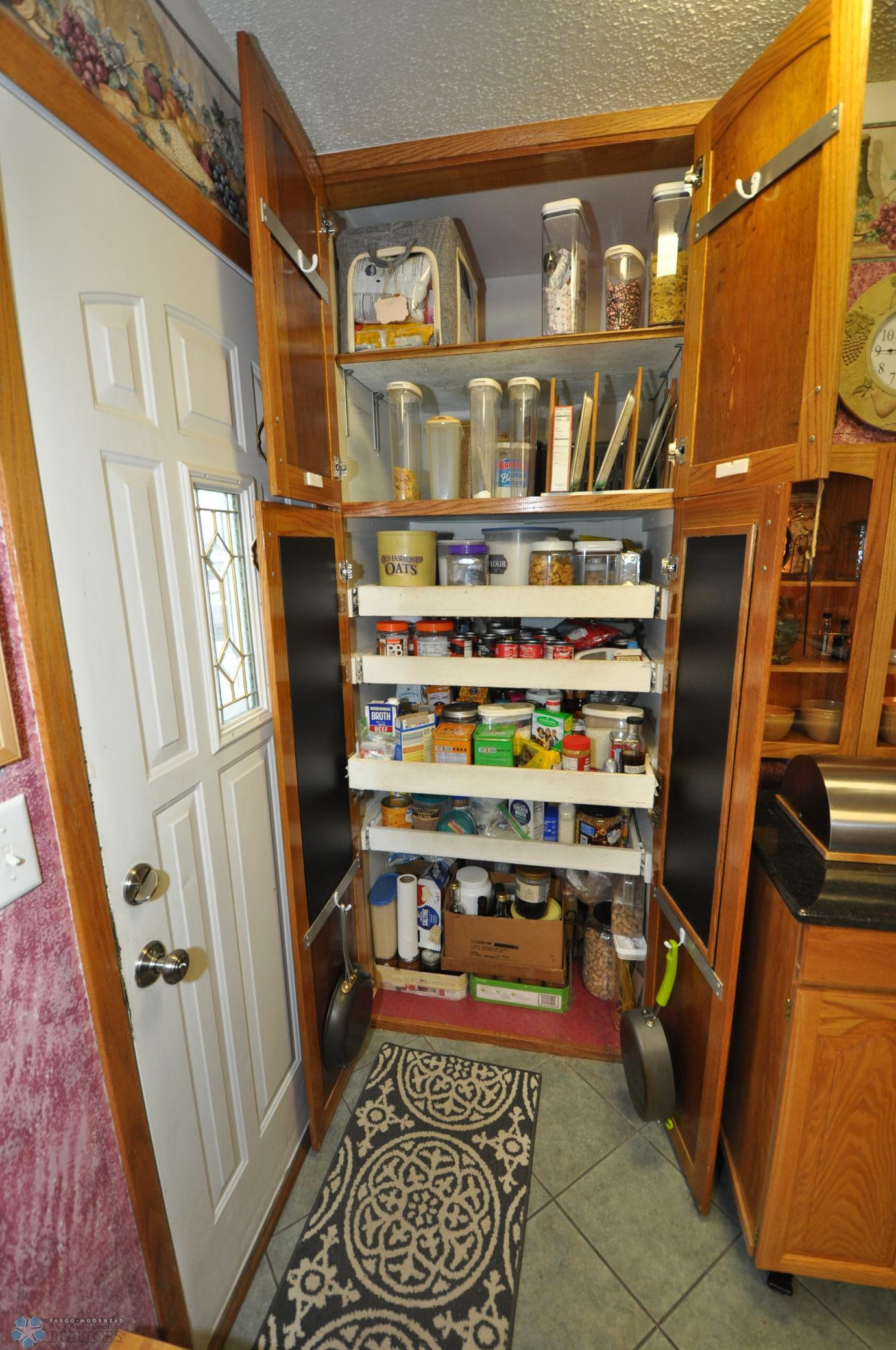 Pantry with roll-out shelving