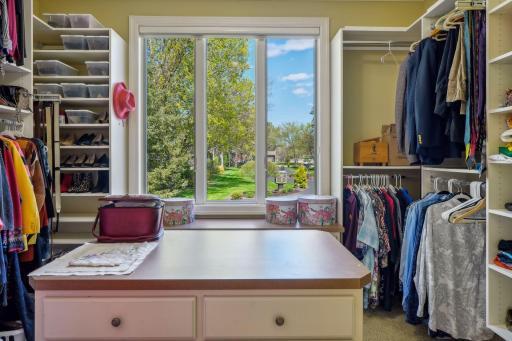 Walk-in closet in primary bedroom.