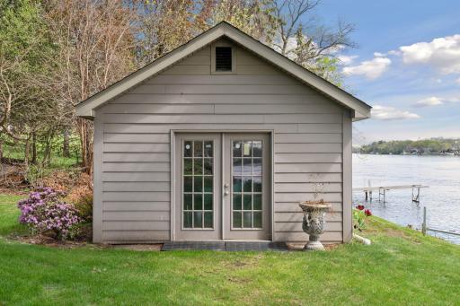 Boat house down at the river. Grandfathered in and cannot be duplicated. Great place to store items for enjoying the river or potential to turn it into whatever you want!