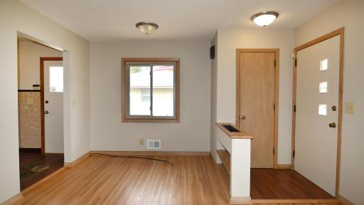 The Home Opens Into The Living Room With Beautiful Hardwood Floors.