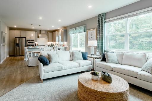 Open layout provides a great space to entertain and do your everyday life. *Photo used is of a former model as an example on how to furnish.