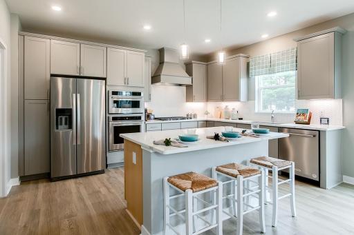 Photo for 1655 Oak Creek Drive, Chaska, MN 55318 - Listing #6501372 Spacious kitchen with ample counter space. *Photo used is of a former model as an example on how to furnish.