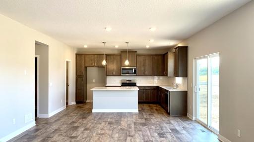 Photo for 1655 Oak Creek Drive, Chaska, MN 55318 - Listing #6501372 Generous kitchen and informal dining as well as large walk-in pantry. Adjacent to mudroom entry from garage making it easy to bring in groceries etc! Actual photo of home!