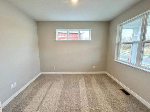 Designated main floor office with double doors located off the foyer entry. Love the windows and view out the front. Don't need an office? This could be a great homework space, playroom, workout room or a great place for a piano. Endless options!