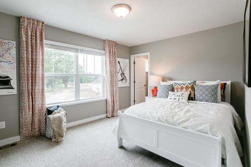 Photo for 1655 Oak Creek Drive, Chaska, MN 55318 - Listing #6501372 Secondary bedroom. *Photo used is of a former model as an example on how to furnish.