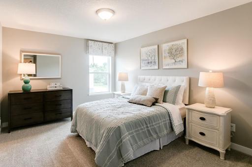 Photo for 1655 Oak Creek Drive, Chaska, MN 55318 - Listing #6501372 Secondary bedroom. *Photo used is of a former model as an example on how to furnish.