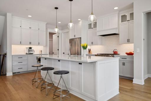 Center island is ideal for grabbing a quick bite to eat or a place to prep meals