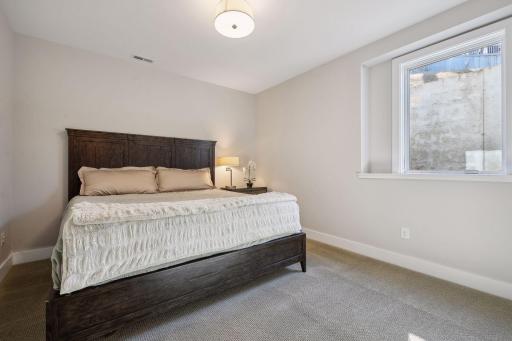 The home's fifth bedroom is located in the lower level