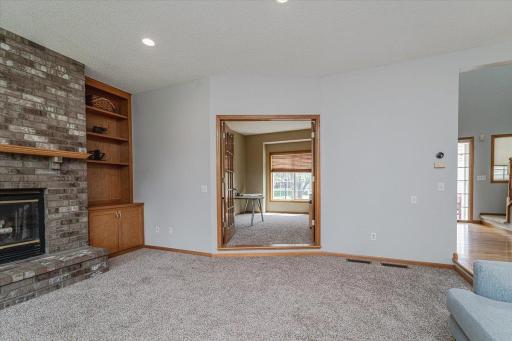 The family room opens to the den/office space.