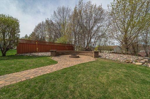 This paver pathway and firepit is part of your backyard!