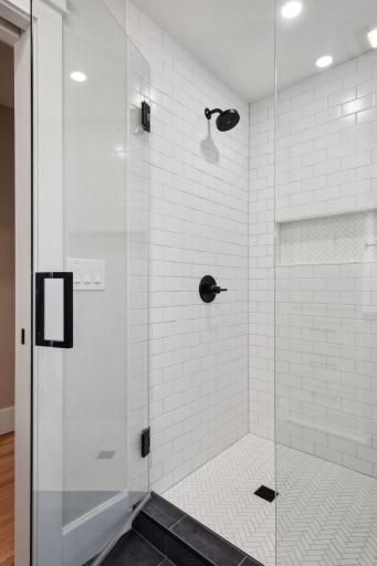 Second floor bathroom showcases clean and sleek design.