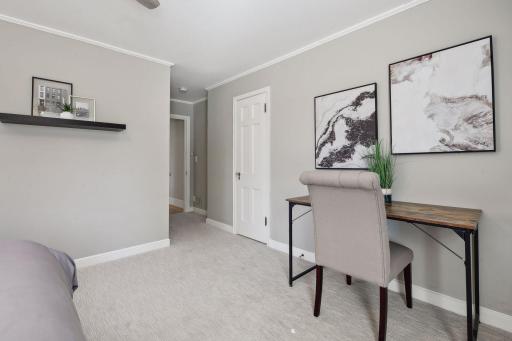Upstairs features four bedrooms with walk-in closets.