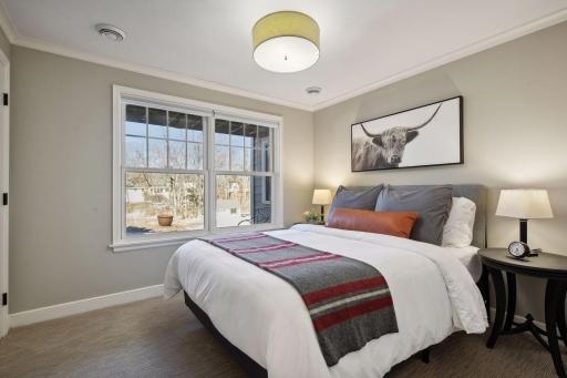 Lower level fifth bedroom is spacious and perfect for guests.