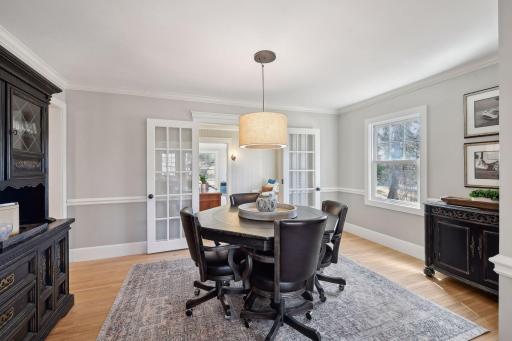 There is a wonderful center room that is perfect as a game room, dining area or sitting area and through the French doors an ideal main level office. The flow is AWESOME!