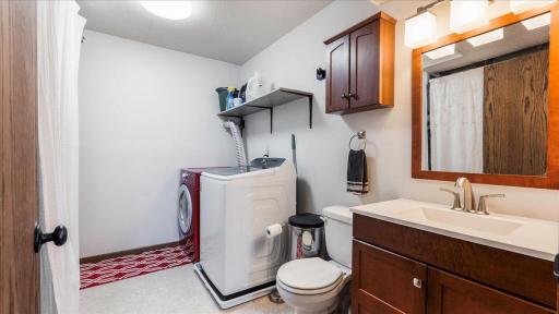 Bonus lower 1/2 bath with Laundry and utilties in one convenient place