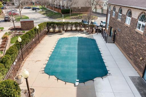 Heated in-ground pool is right across the street from this unit!