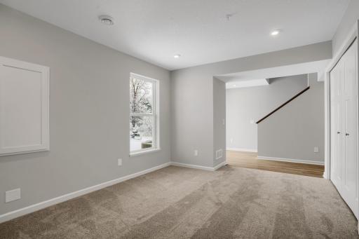 Lower level Rec room. Photo of same floorplan. Selections and finishes will vary.