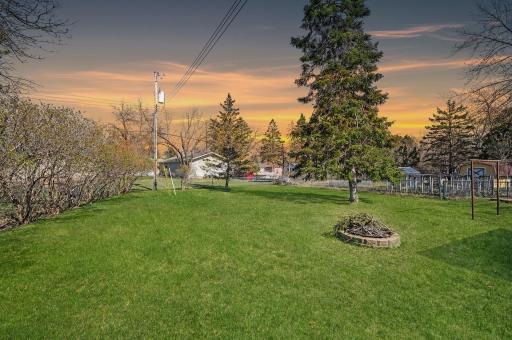 .32 acre lot is fully fenced and offers tons of green space!