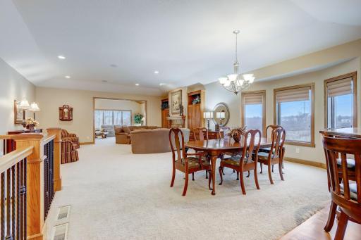 Entertain effortlessly with the surround sound system and breakfast bar seating in the kitchen, just steps away from the large formal dining room.