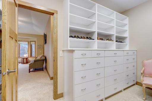 View of one of the large walk-in closets off the primary bedroom.