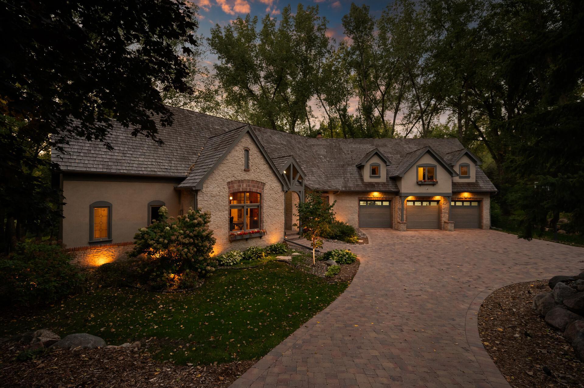 From the moment you approach, you'll be captivated by the charming French country ambiance that graces every inch of this residence.