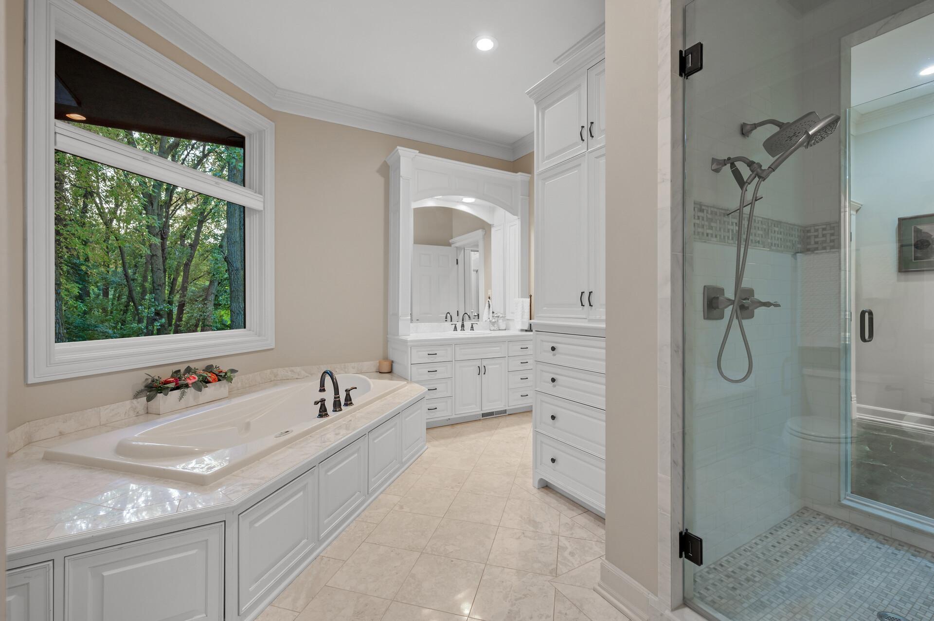 Separate jetted tub & walk-in shower.