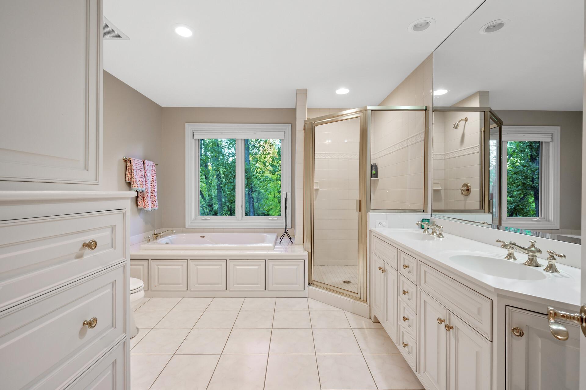 Upper level second primary bathroom.
