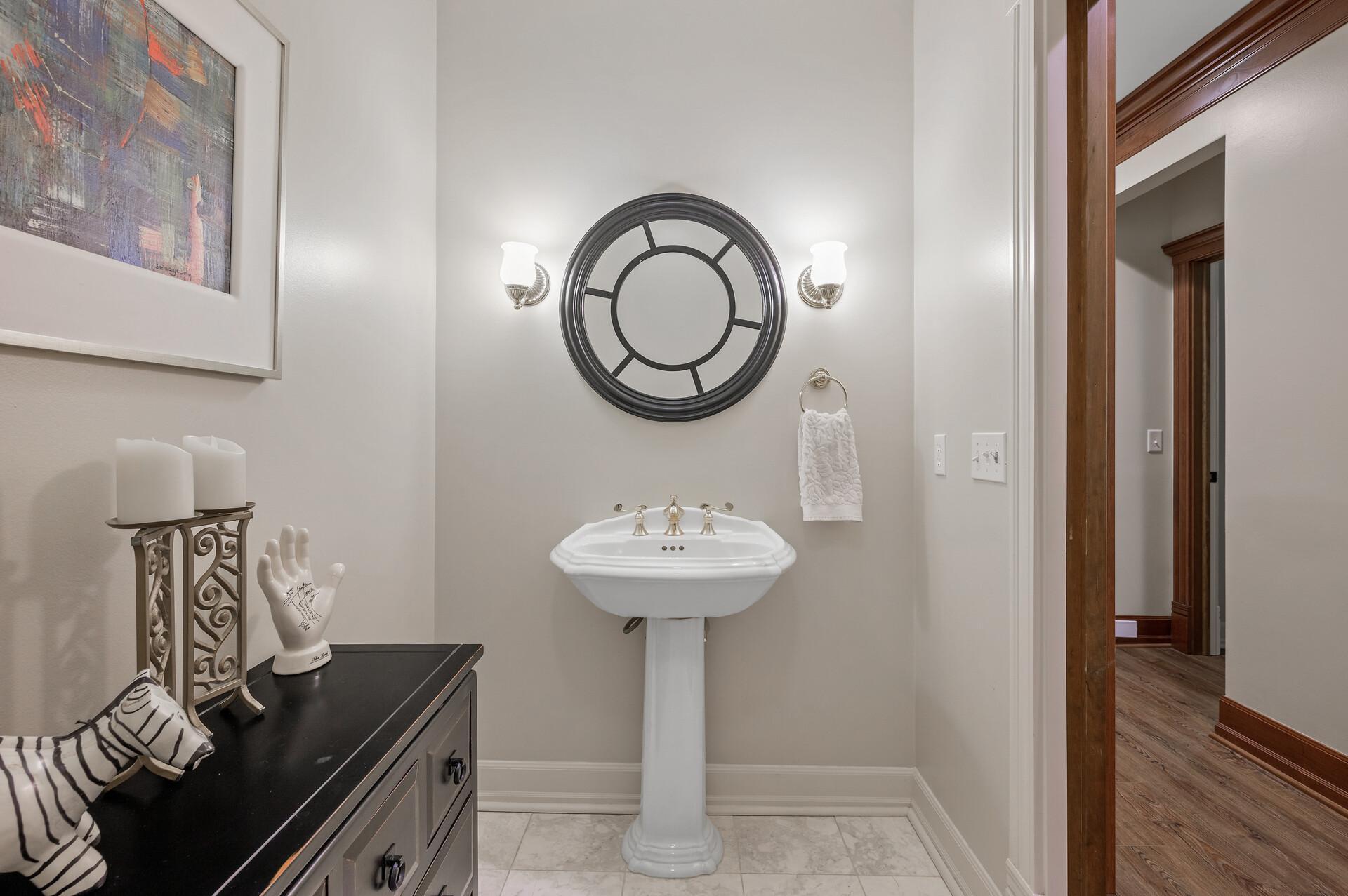 Lower level half bathroom.