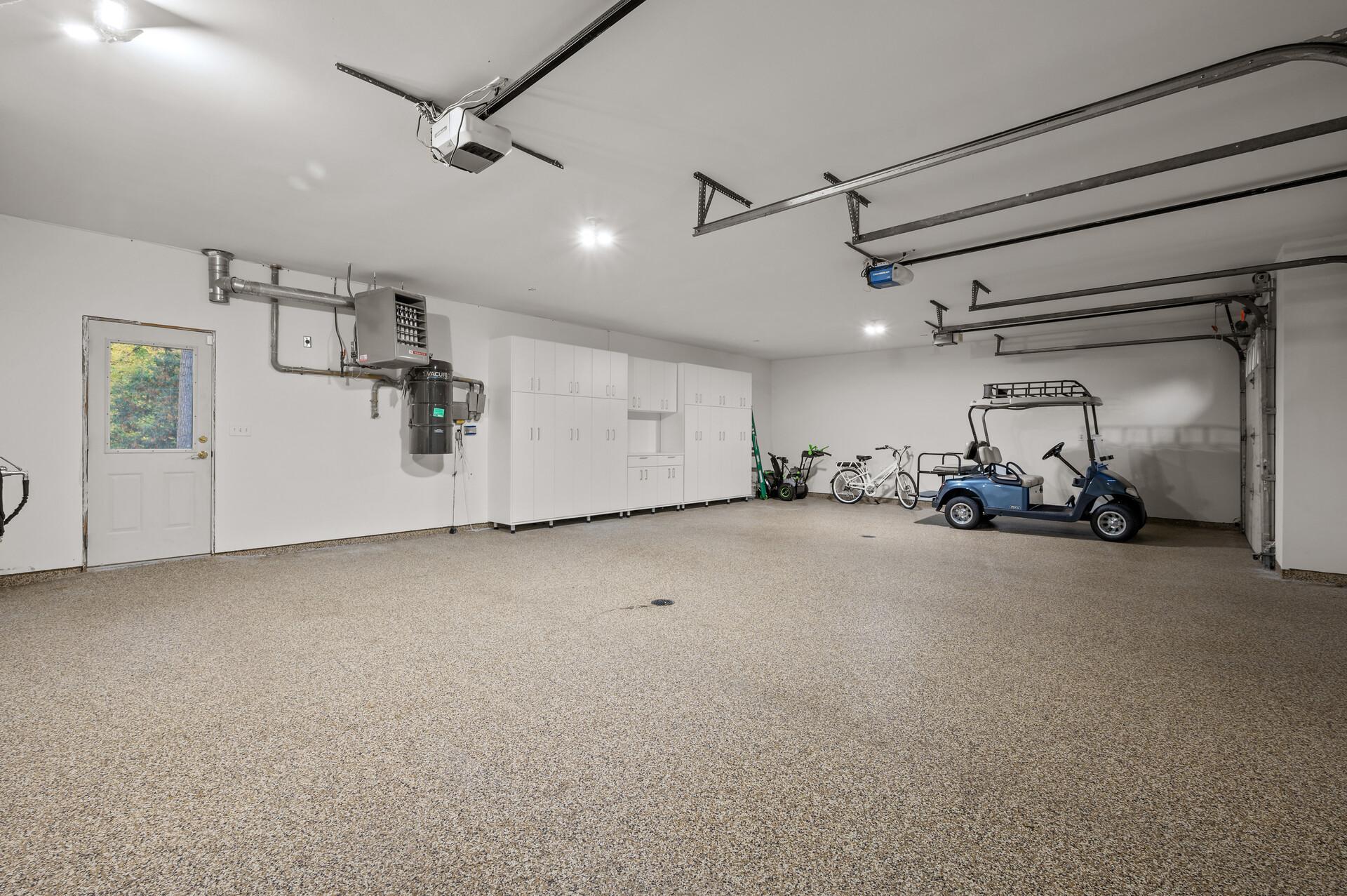This residence also features an attached 3-car garage with newly epoxied floors and a California closet system for extra organization.