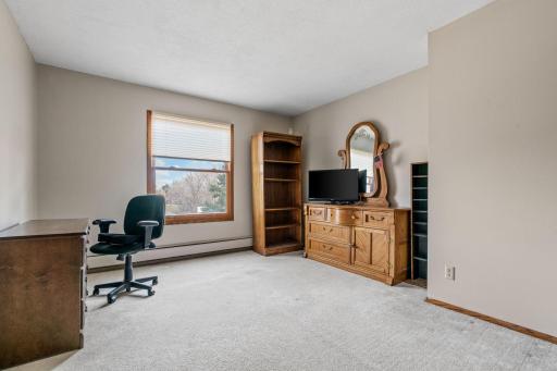 Second guest bedroom works well as a home office or den/study