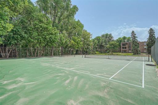 Tennis and pickleball on sunny spring days just steps from your condo home
